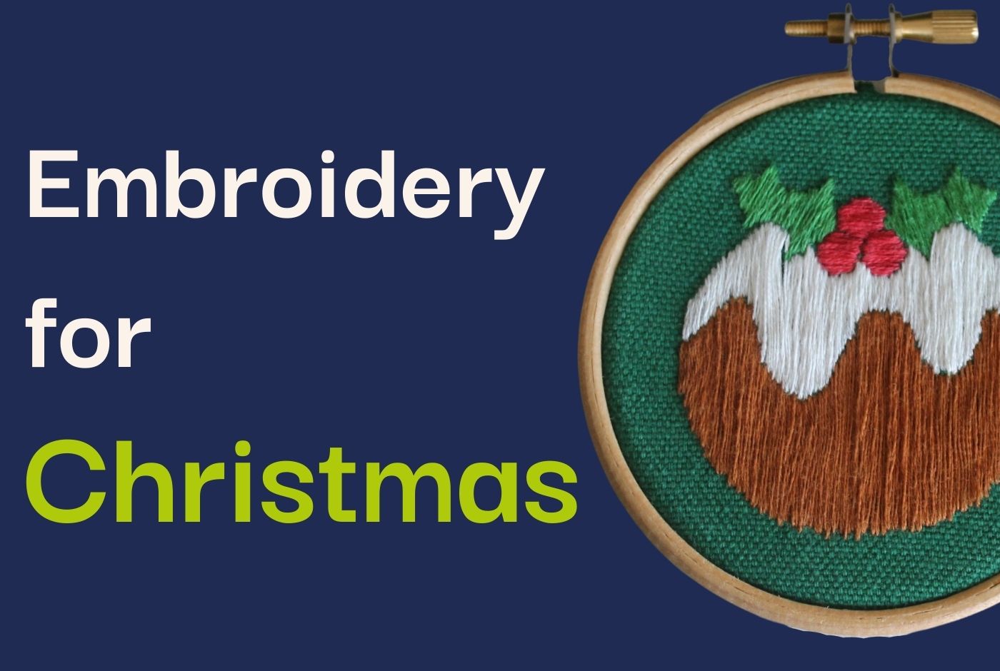 A photo of an embroidered Christmas pudding bauble on green fabric.