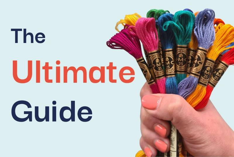 A hand holding a bunch of coloured embroidery thread alongside text saying 'the ultimate guide'.