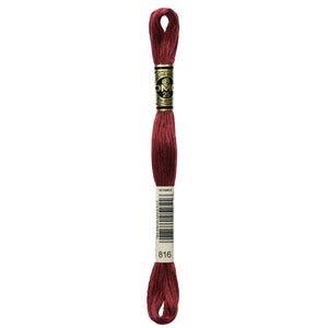 One skein of DMC Mouliné Stranded Cotton thread Colour code 816
