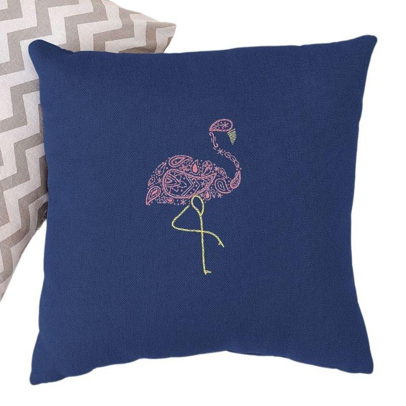 Flamingo embroidery pattern stitched on a cushion