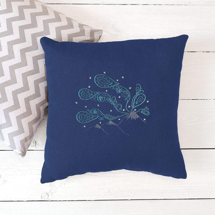 Northern lights embroidery kit pattern stitched on a cushion