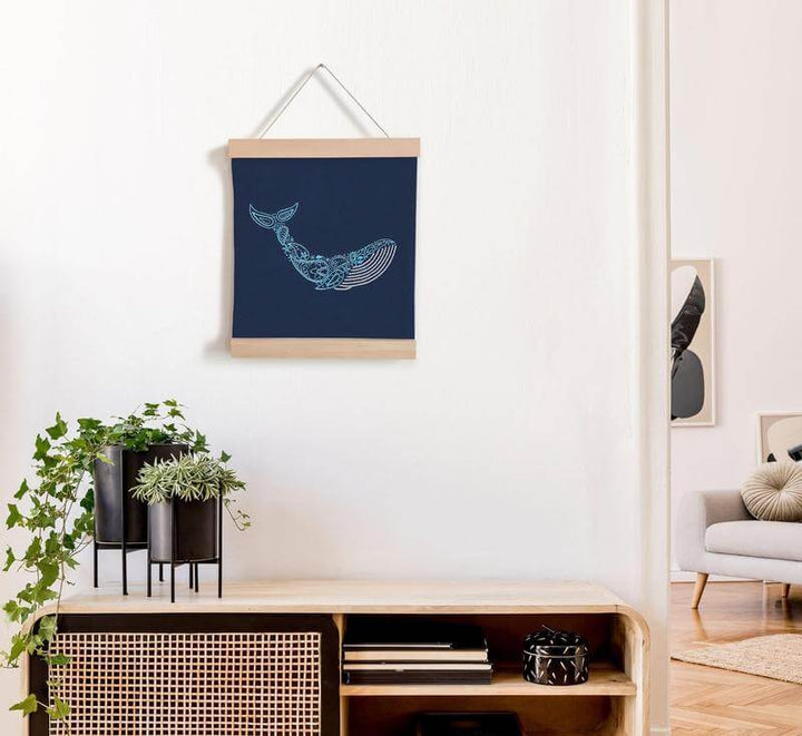 Whale embroidery pattern hanging in a banner